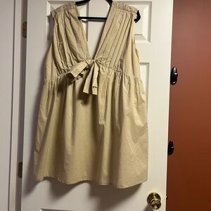 Cream Sleeveless Dress with Bow Detail